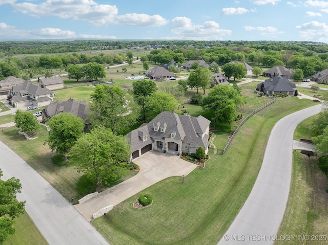 drone / aerial view with a residential view