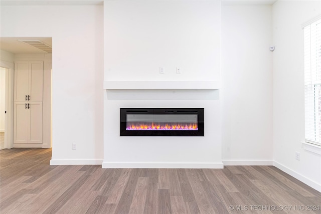 interior details with hardwood / wood-style flooring