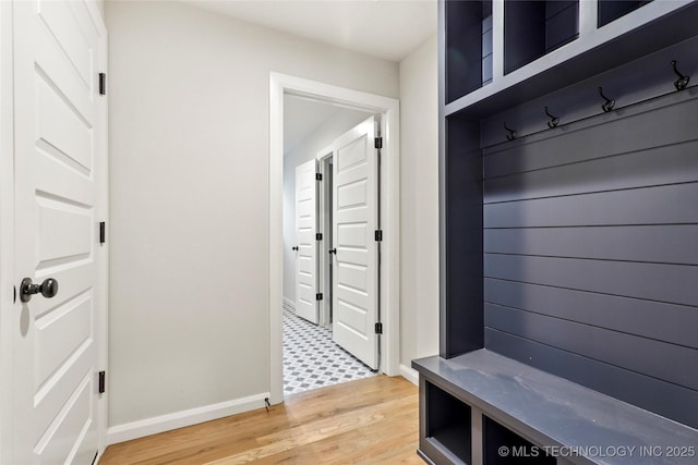 mudroom featuring wood-type flooring