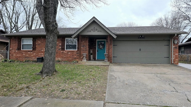 ranch-style house with a garage and a front yard