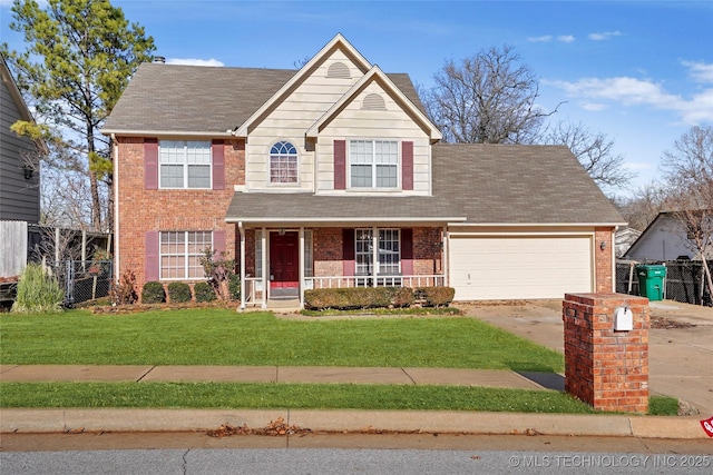 view of front of house with a porch, a garage, and a front yard