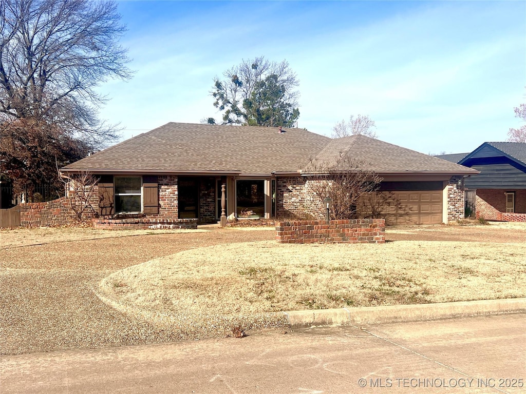 ranch-style home with a garage