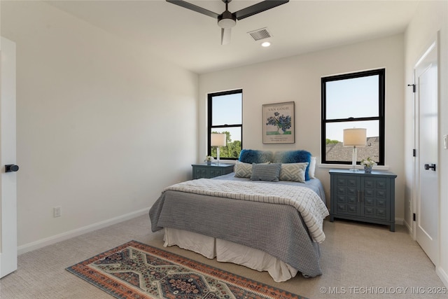 carpeted bedroom featuring ceiling fan