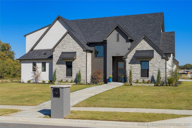 view of front of home featuring a front lawn