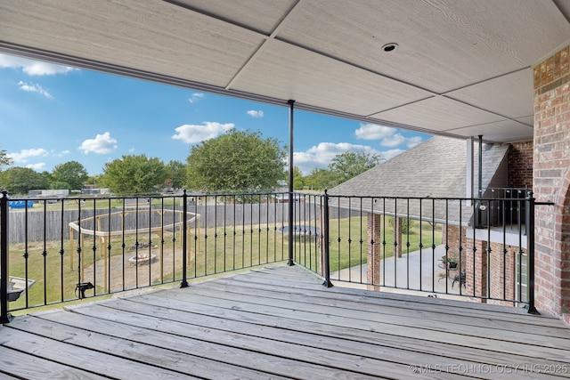 wooden deck with a yard