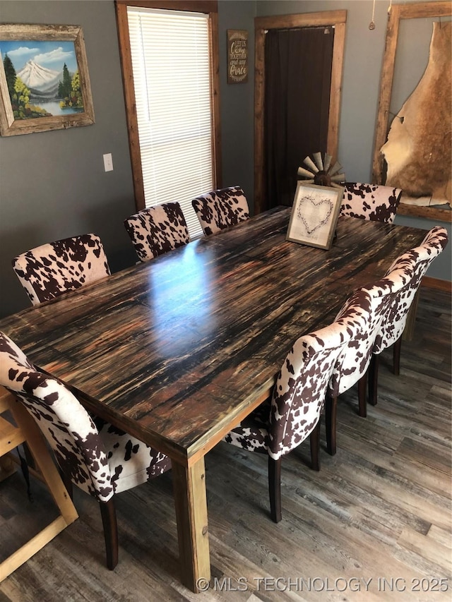 dining room featuring hardwood / wood-style flooring