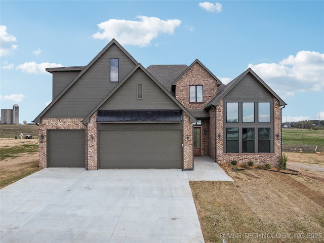 craftsman-style house with concrete driveway, an attached garage, brick siding, and a front lawn