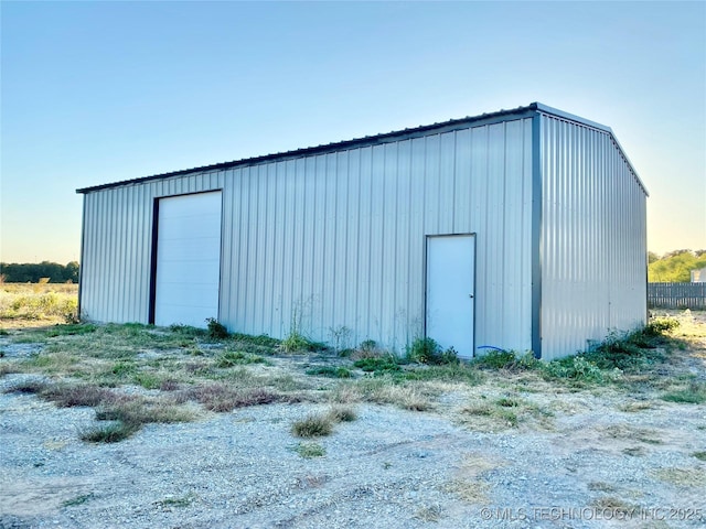 view of outdoor structure featuring a garage