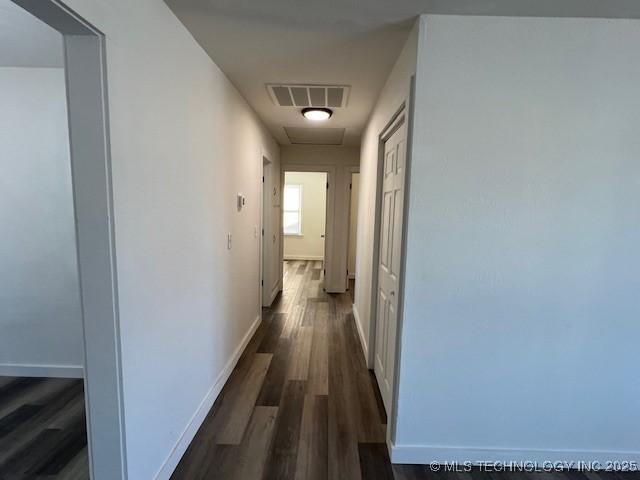 hall featuring dark hardwood / wood-style floors