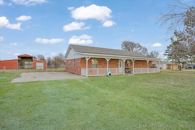 exterior space featuring a lawn and covered porch