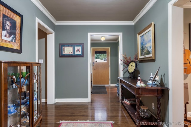 corridor featuring dark hardwood / wood-style floors and crown molding