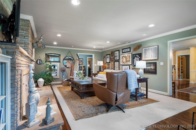 living room featuring crown molding and light wood-type flooring