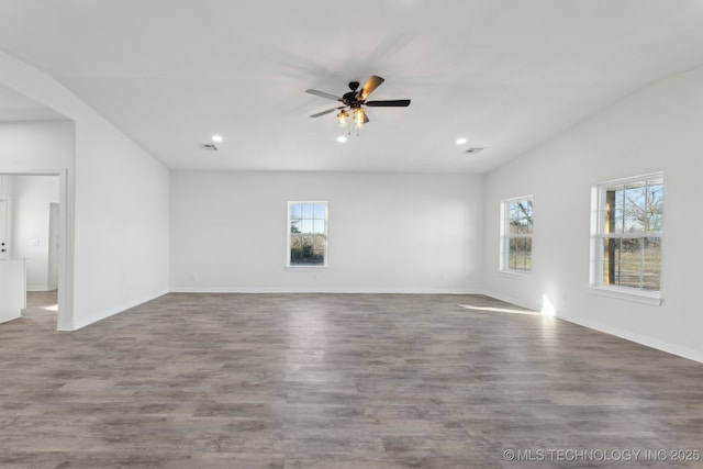 empty room featuring hardwood / wood-style floors and ceiling fan