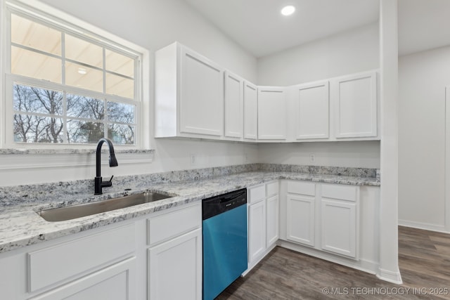 kitchen featuring white cabinetry, dishwasher, and sink