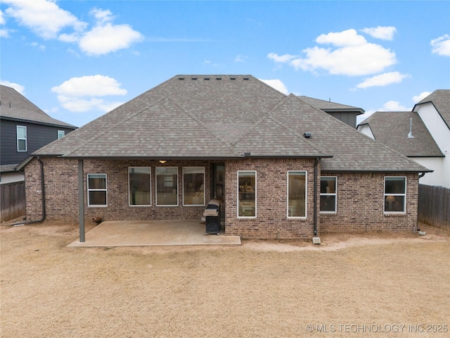 rear view of property with a patio