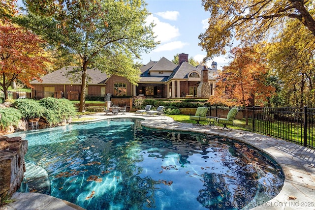 view of pool featuring a patio