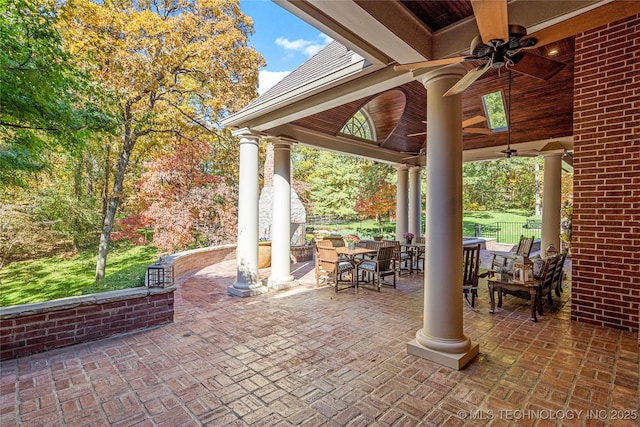 view of patio featuring ceiling fan