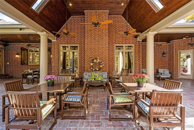 view of patio / terrace featuring ceiling fan, an outdoor hangout area, and french doors