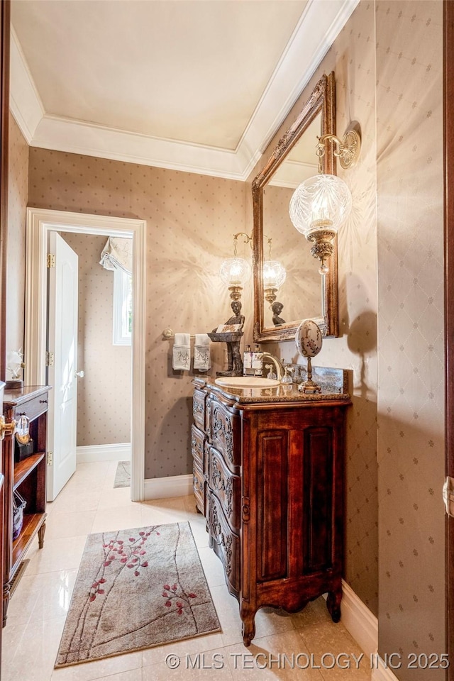 bathroom featuring vanity and ornamental molding