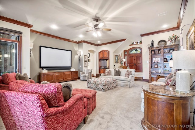 carpeted living room with ceiling fan