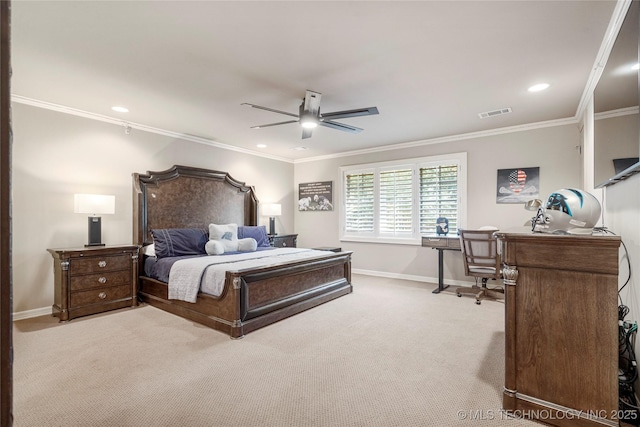 carpeted bedroom with ceiling fan and ornamental molding