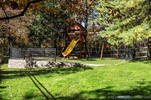 view of jungle gym featuring a yard