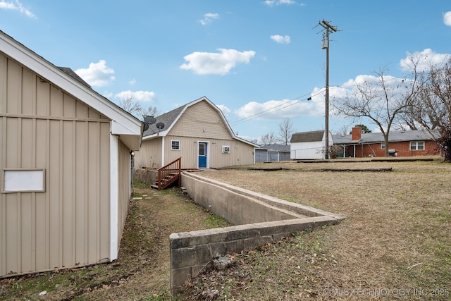 201 Sandy Cir, Tahlequah, OK 74464 - back of house featuring board and batten siding