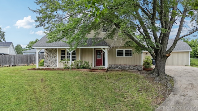 201 Sandy Cir, Tahlequah, OK 74464 - view of front of house with roof with shingles, stone siding, and concrete driveway