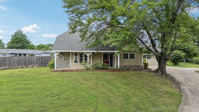 201 Sandy Cir, Tahlequah, OK 74464 - view of front of property with stone siding, a shingled roof, and covered porch