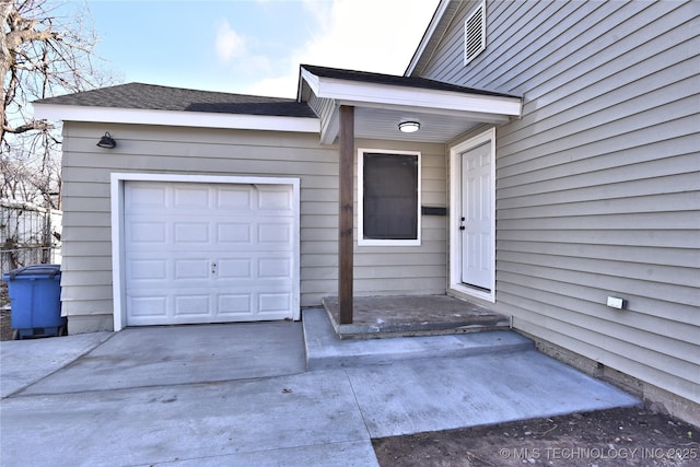 property entrance with a garage