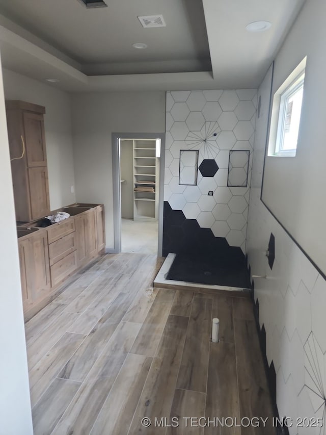 bathroom featuring hardwood / wood-style flooring