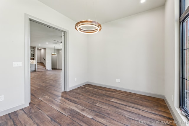 425 W Ft Worth St, Broken Arrow, OK 74012 - unfurnished dining area with recessed lighting, baseboards, stairs, and dark wood-style floors