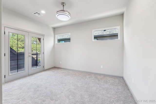 425 W Ft Worth St, Broken Arrow, OK 74012 - carpeted spare room with baseboards, french doors, and visible vents