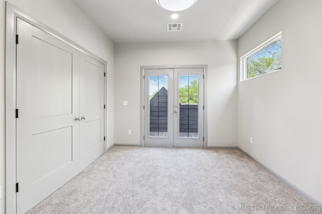 425 W Ft Worth St, Broken Arrow, OK 74012 - interior space with visible vents, access to exterior, french doors, baseboards, and light colored carpet