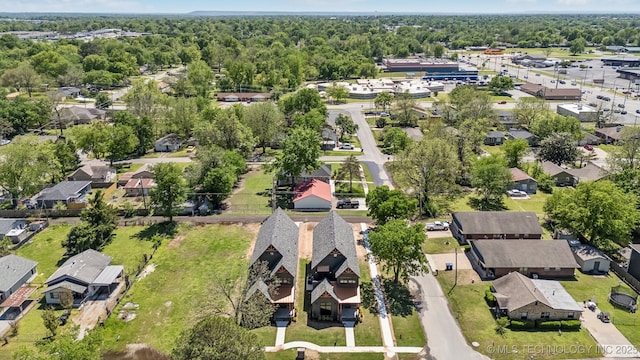 425 W Ft Worth St, Broken Arrow, OK 74012 - birds eye view of property with a residential view and a wooded view