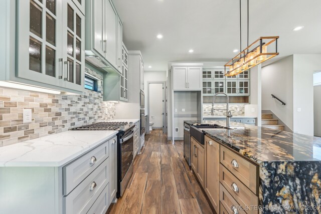 425 W Ft Worth St, Broken Arrow, OK 74012 - kitchen with stainless steel appliances, a sink, recessed lighting, and dark wood finished floors