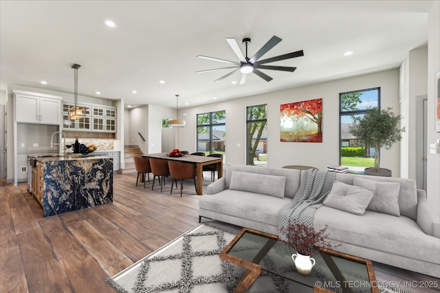 425 W Ft Worth St, Broken Arrow, OK 74012 - living area with stairway, a healthy amount of sunlight, wood finished floors, and recessed lighting