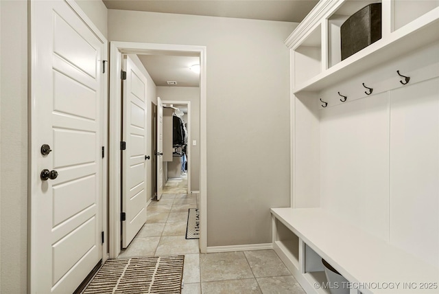 mudroom featuring light tile patterned floors