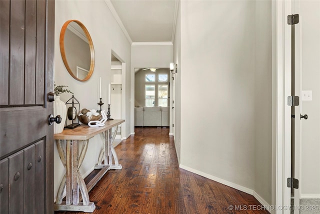 corridor featuring hardwood / wood-style flooring and ornamental molding