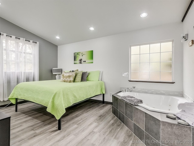 bedroom featuring light wood-type flooring