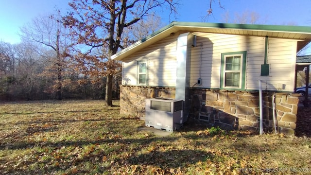 view of home's exterior featuring central AC