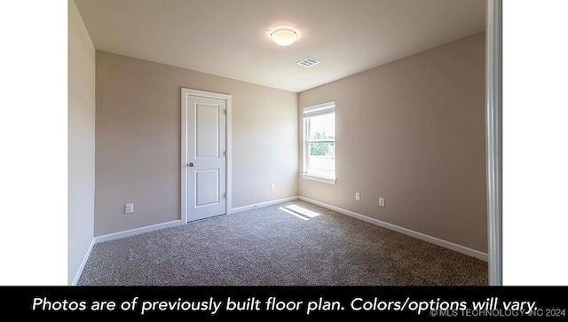 view of carpeted spare room