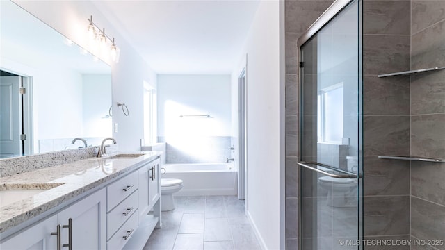 full bathroom featuring tile patterned floors, independent shower and bath, toilet, and a wealth of natural light