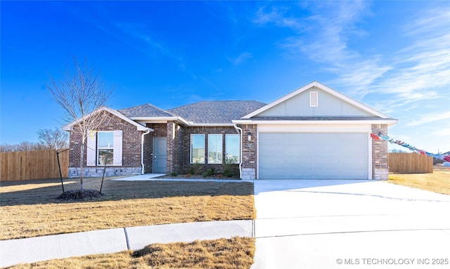 ranch-style home featuring a garage and a front lawn