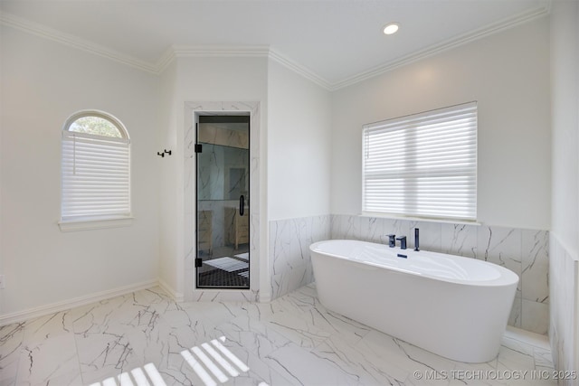 bathroom featuring crown molding and independent shower and bath