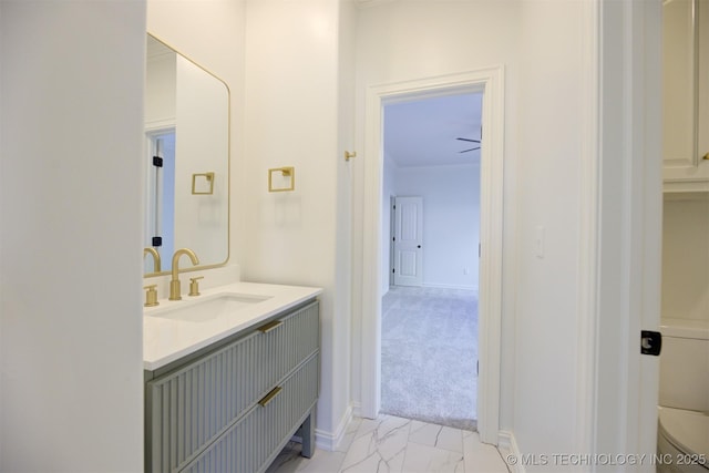 bathroom with vanity and ceiling fan