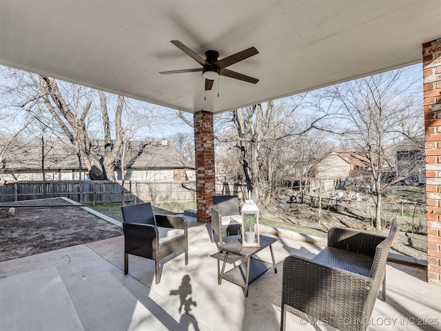 view of patio / terrace featuring ceiling fan