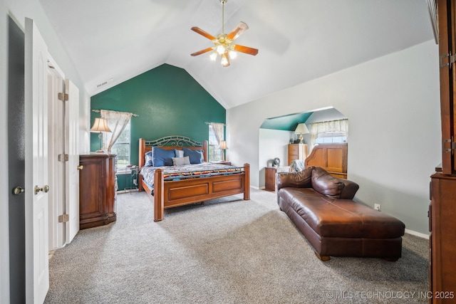 carpeted bedroom featuring ceiling fan and lofted ceiling