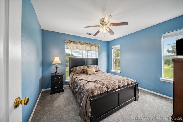 carpeted bedroom with ceiling fan