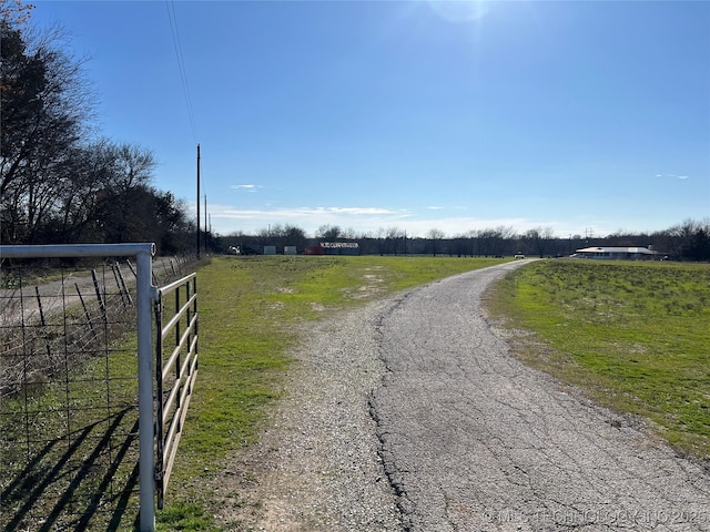 view of road with a rural view